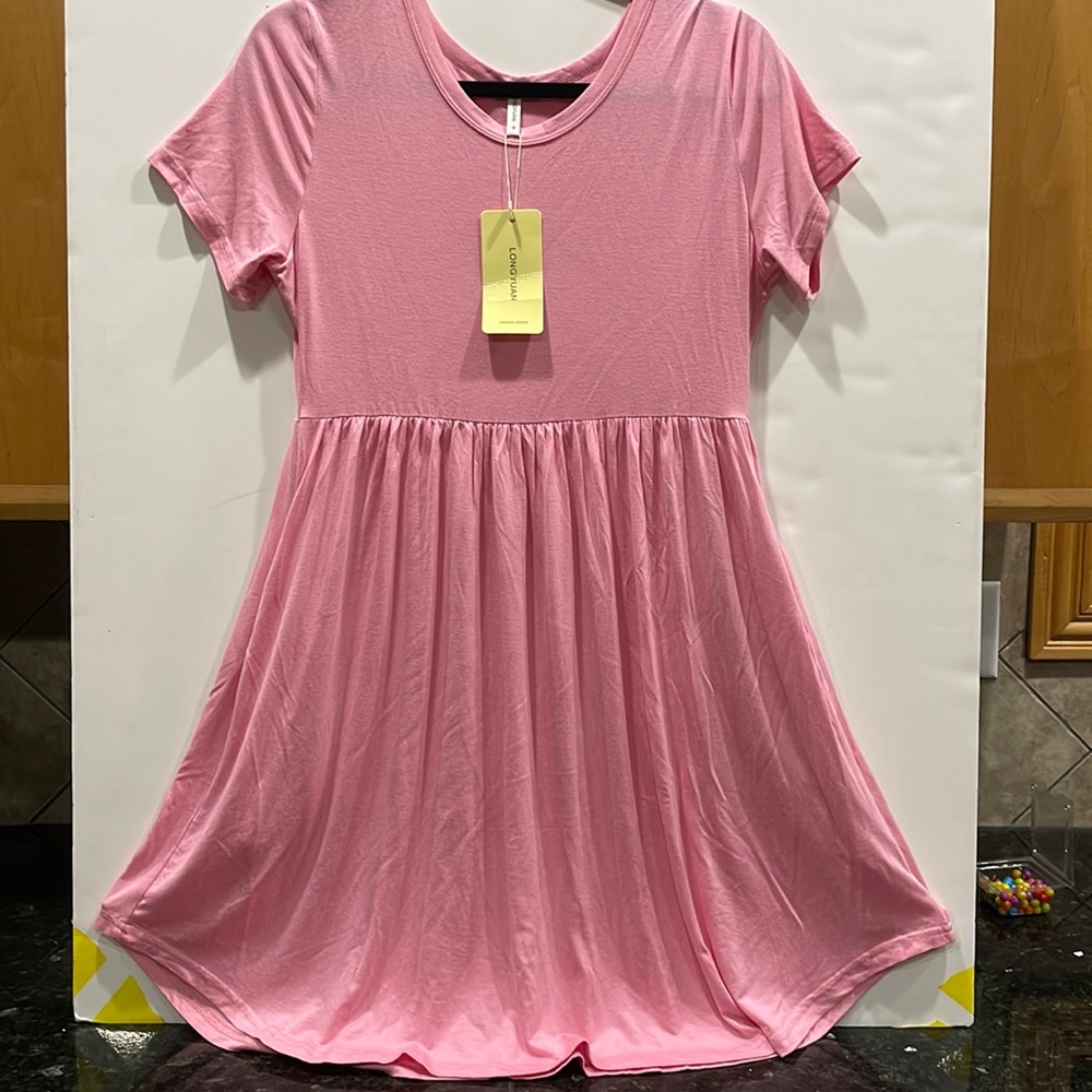 Brand new pink mini dress.
